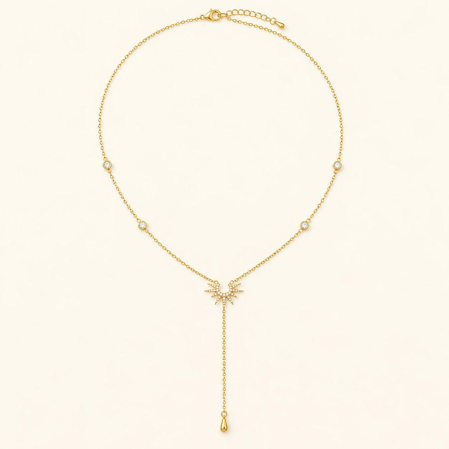 Sunburst Lariat Necklace shown for scale