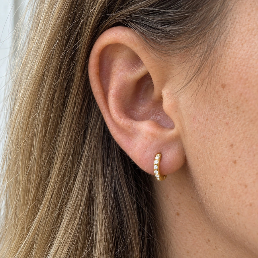 Pave Huggie Earrings styled with other pieces