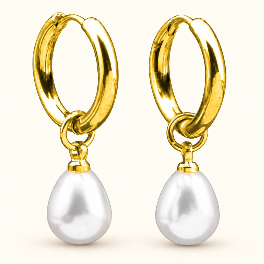 Petite Faux Pearl Huggie Earrings shown for scale