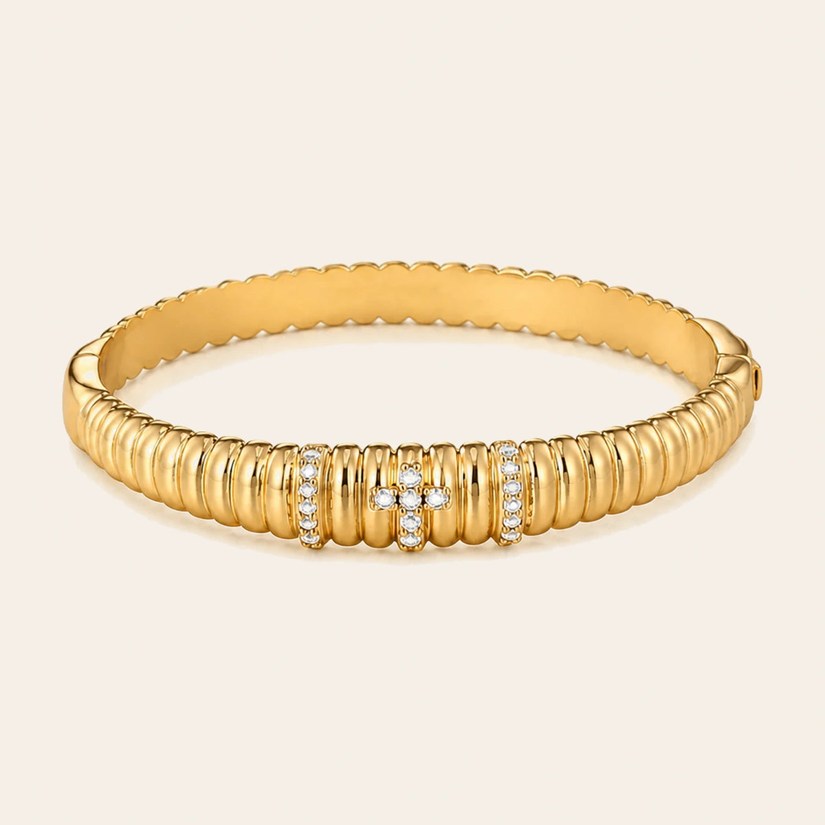 Amada Royal Cross Bangle on ivory background