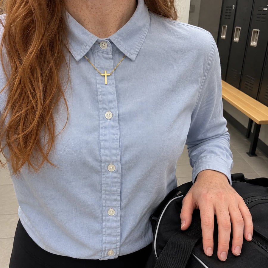 The Classic Cross Necklace styled with other pieces