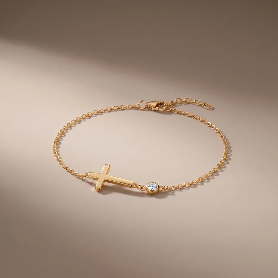 Communion Bracelet, a sealed 18K gold bracelet, on a plain background