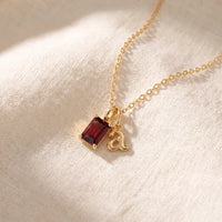 Initial & Birthstone Necklace, a sealed 18K gold personalized initial and birthstone necklace, a keepsake gift for a baptism or First Communion