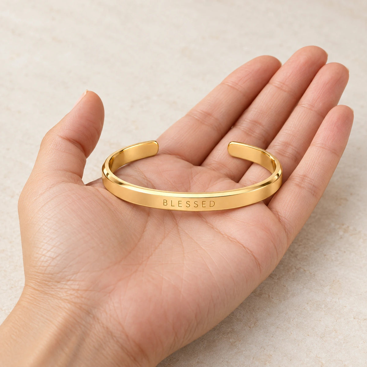 Blessed Word Bracelet held in hand, showing its true scale