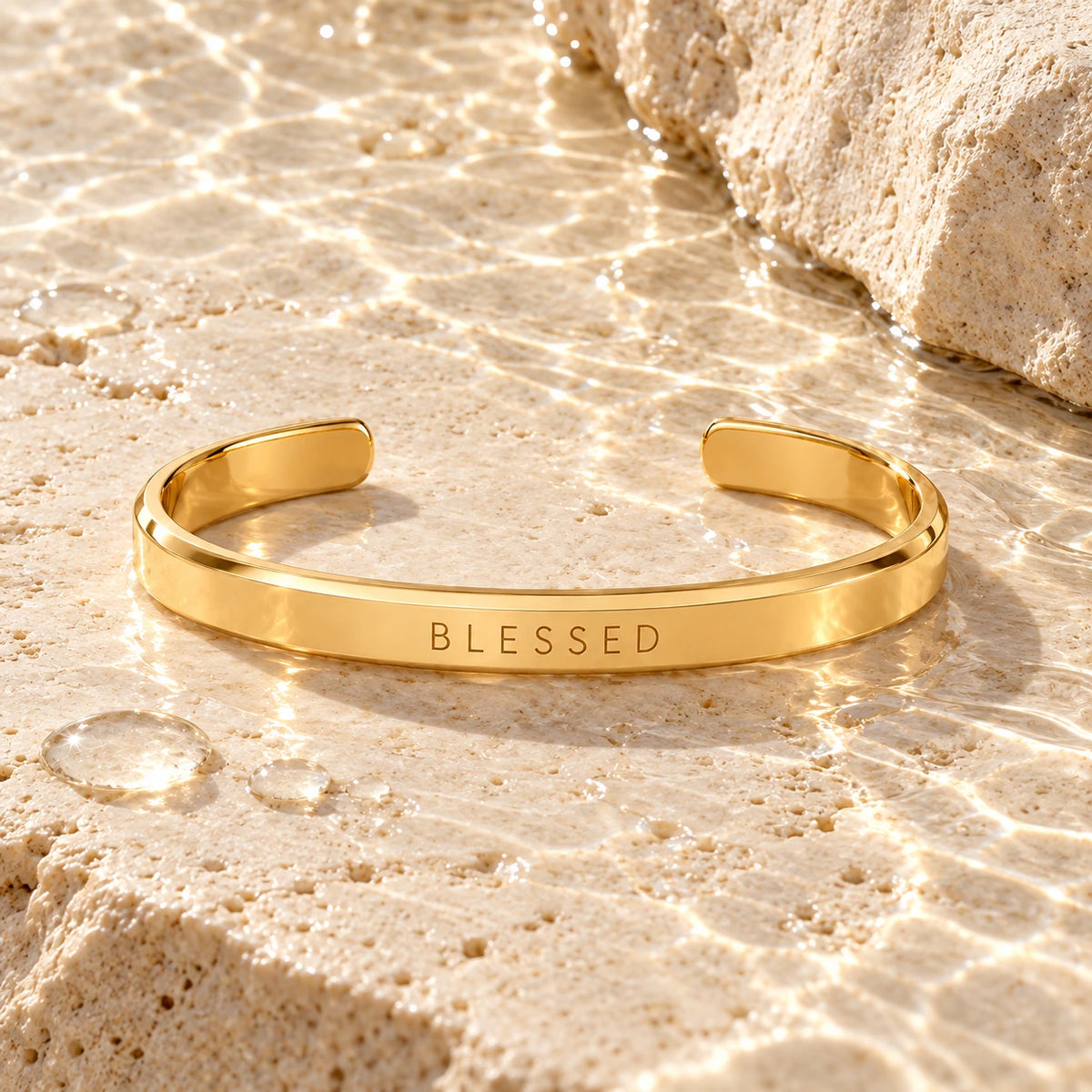 Blessed Word Bracelet with water droplets on stone