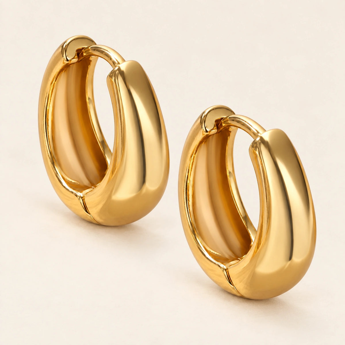 Close-up of the Amada Chunky Hoop Earrings showing its detail and finish.