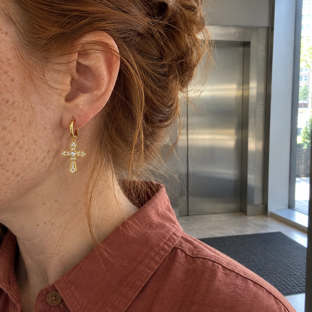 Cross Hoop Earrings worn, first-person view