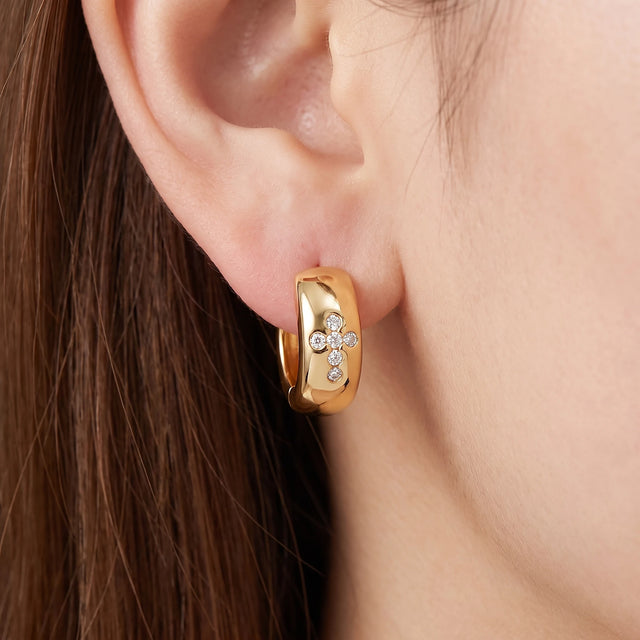 Cross Huggie Earrings worn