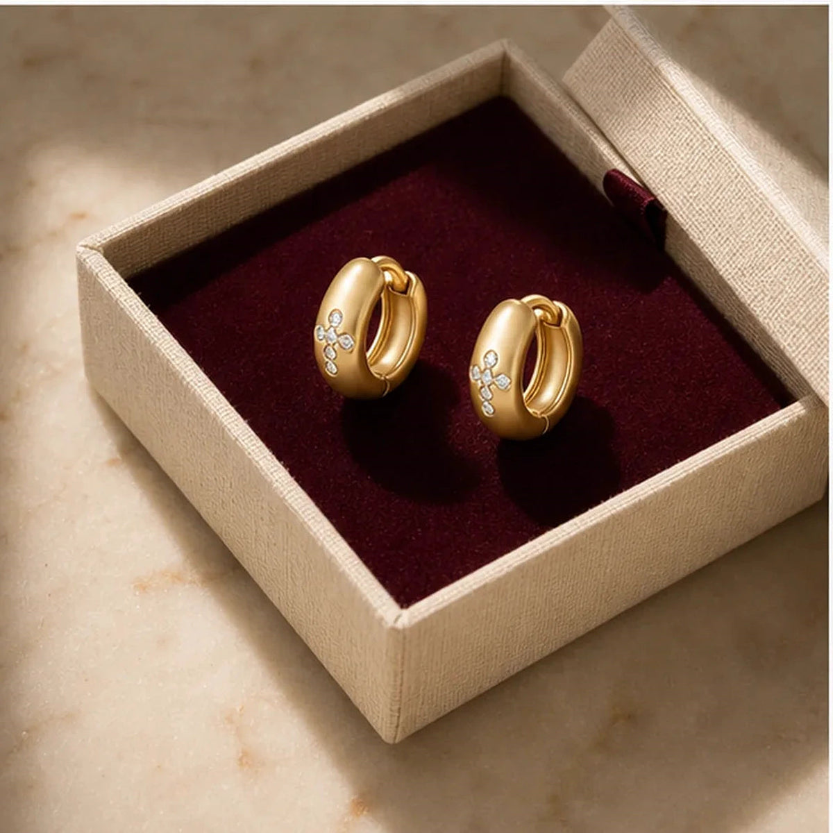Amada | Cross Huggie Earrings | gift box presentation | cycle 3