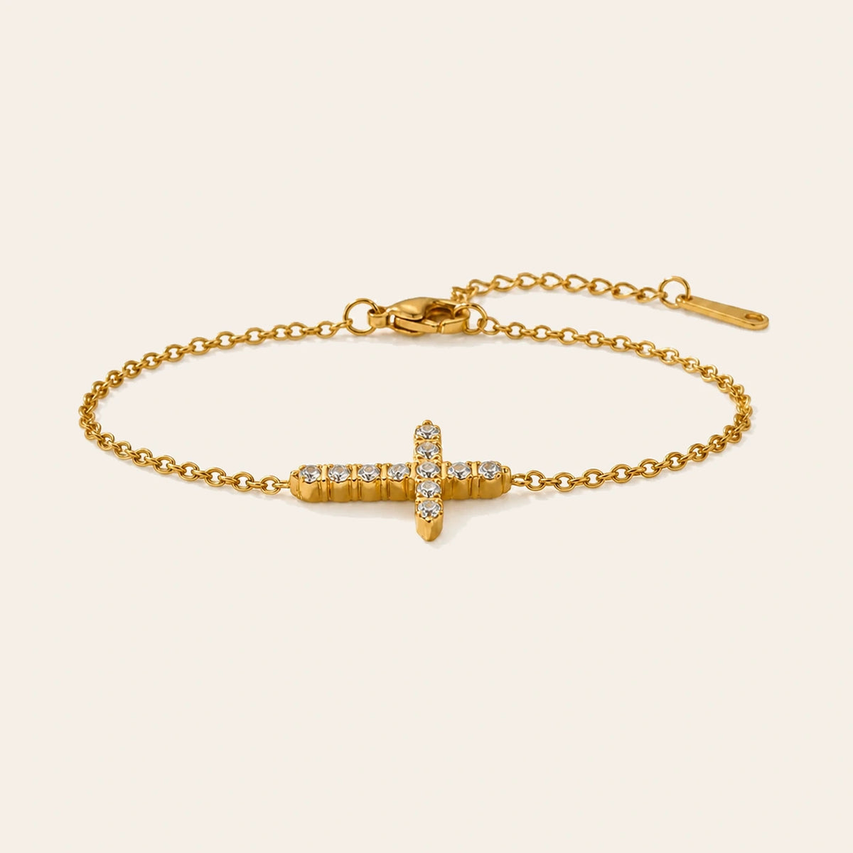 Amada Crystal Cross Bracelet on ivory background