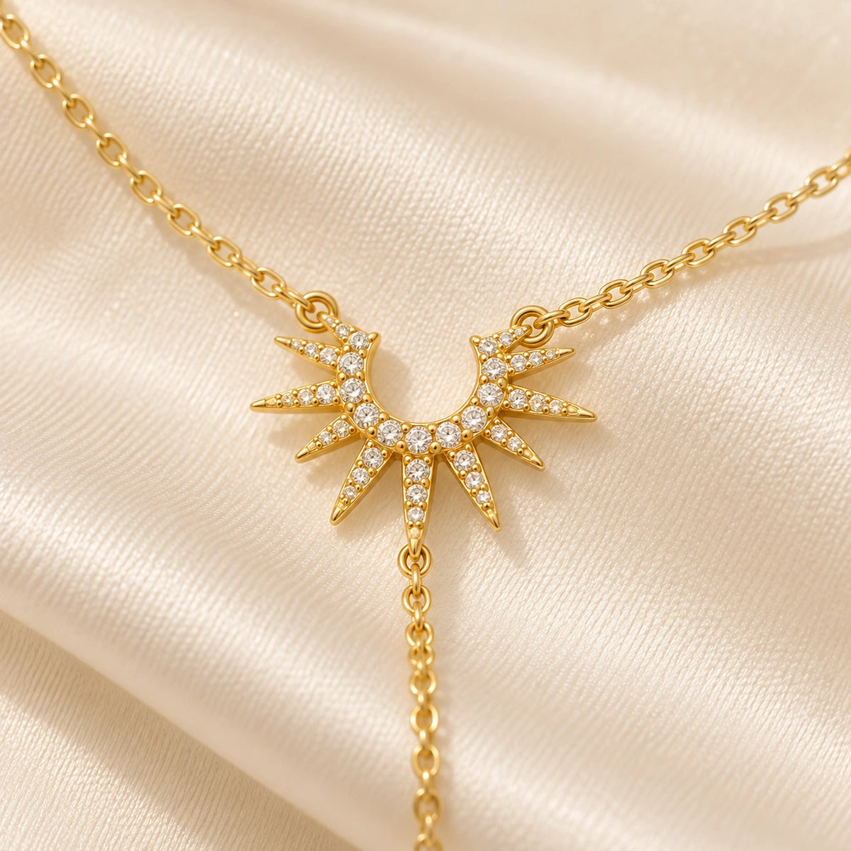 Close-up of the Amada Sunburst Lariat Necklace showing its detail and finish.