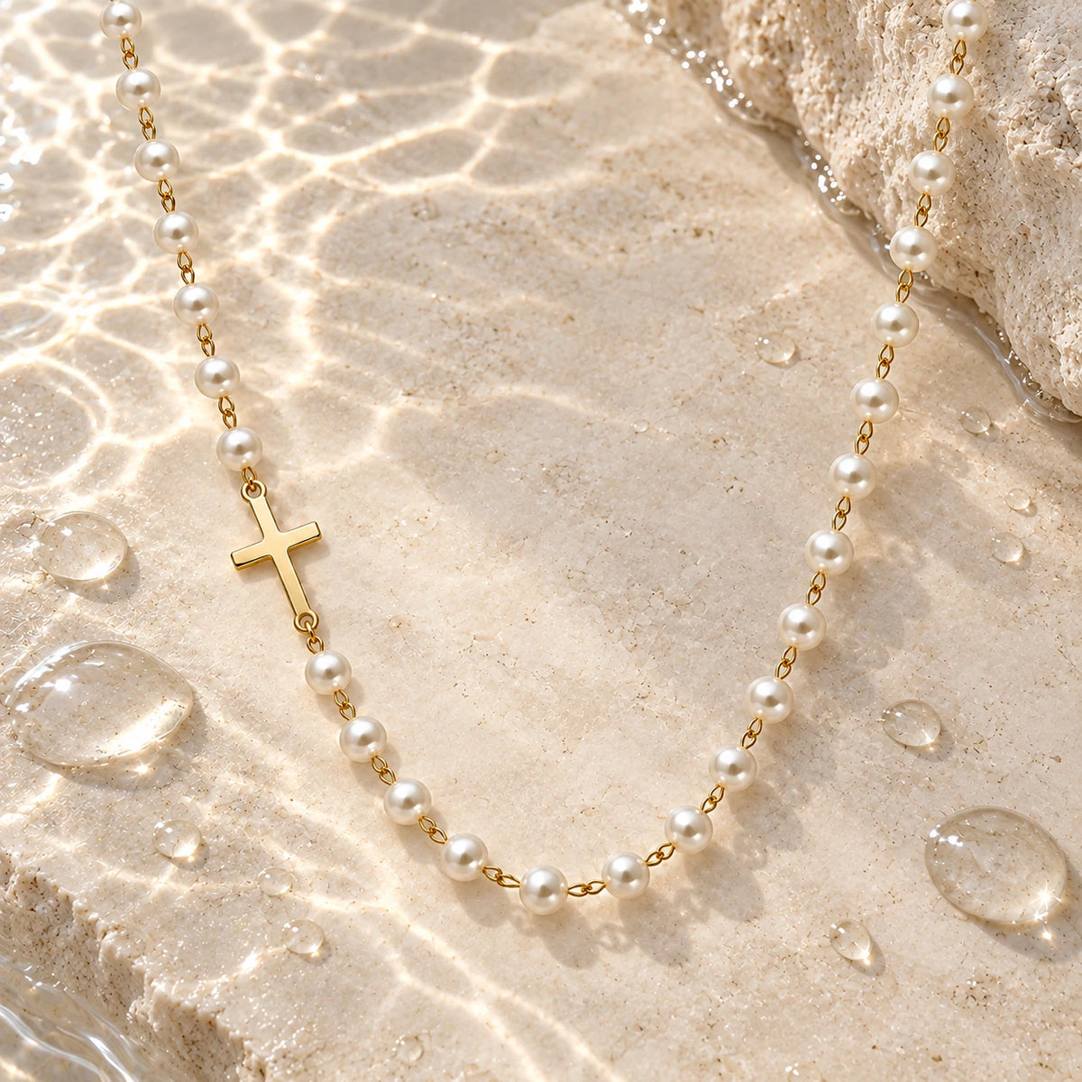 Dainty Faux Pearl Necklace with water droplets on stone