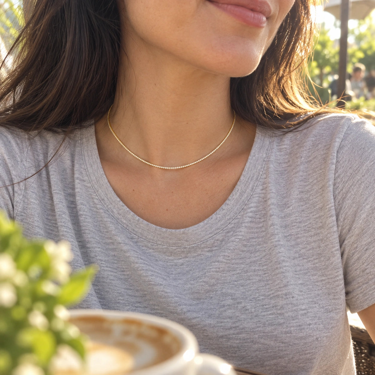 Amada Dainty CZ Tennis Necklace worn by a woman, shown from another angle.