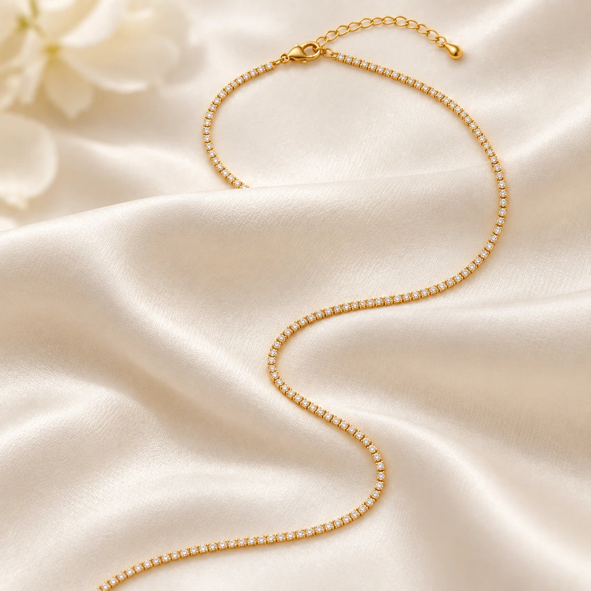 Amada Dainty CZ Tennis Necklace laid flat on fabric.