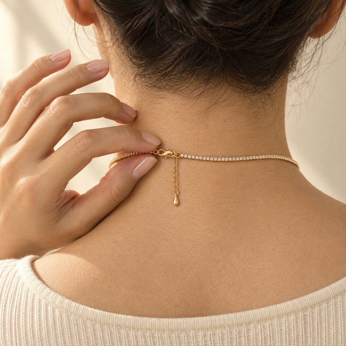 Close-up of the clasp of the Amada Dainty CZ Tennis Necklace.