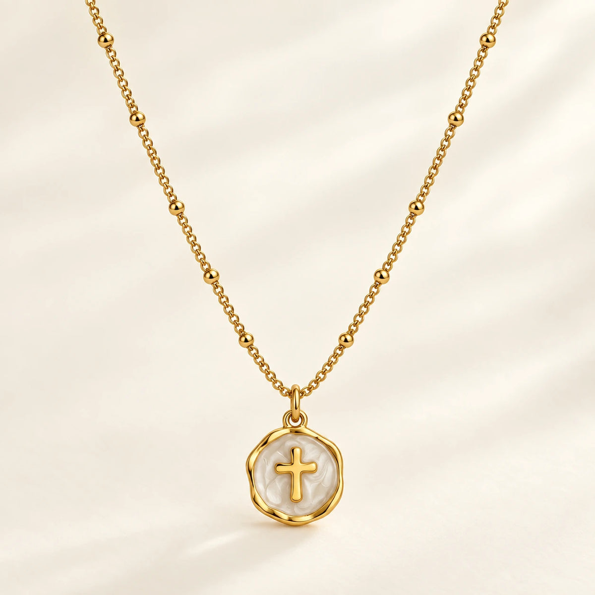Enamel Cross Pendant, shown on its own