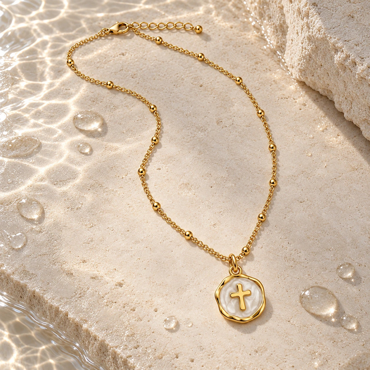 Enamel Cross Pendant with water droplets on stone