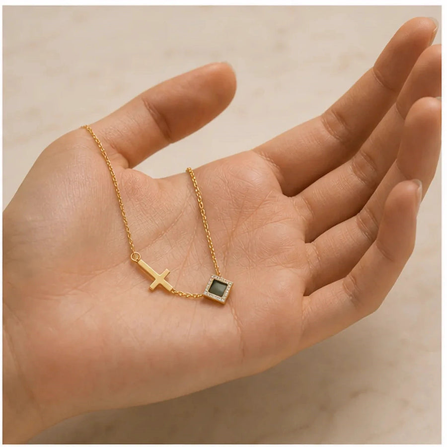 Faith Cross Necklace shown for scale