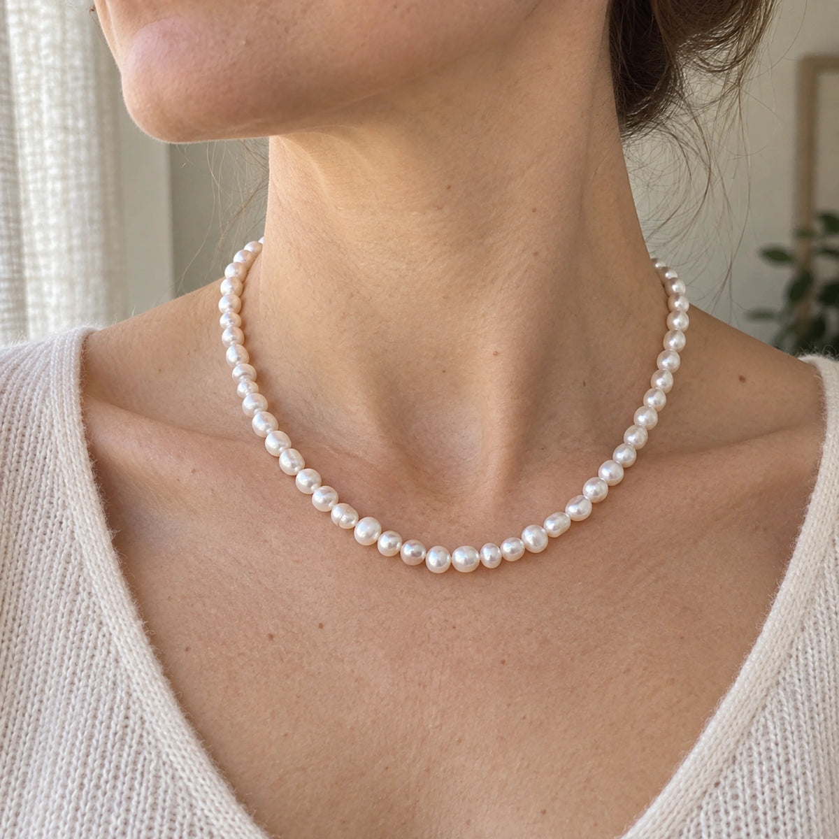 Amada Faux Pearl Strand Necklace in an everyday lifestyle scene.