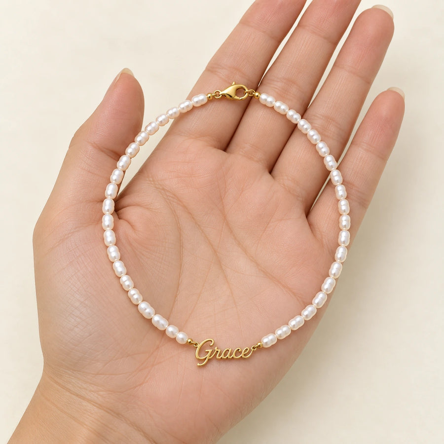 Faux Pearl Name Necklace shown for scale