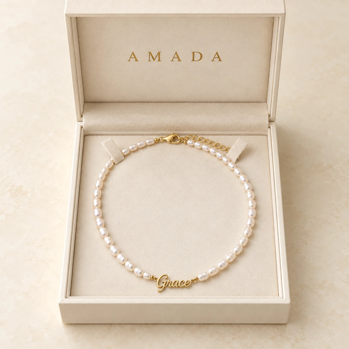 Pearl Name Necklace presented in an Amada box