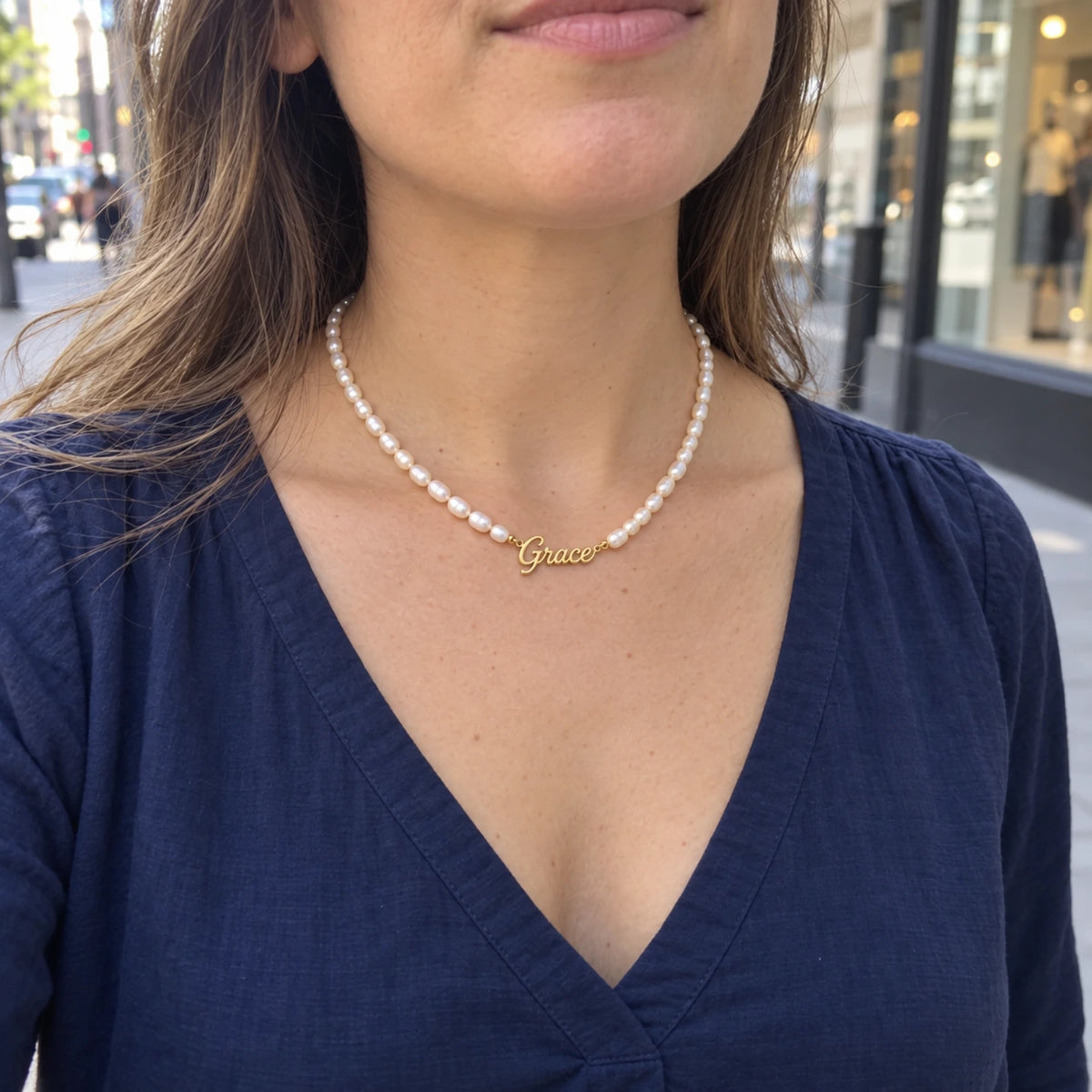 Pearl Name Necklace worn, first-person view