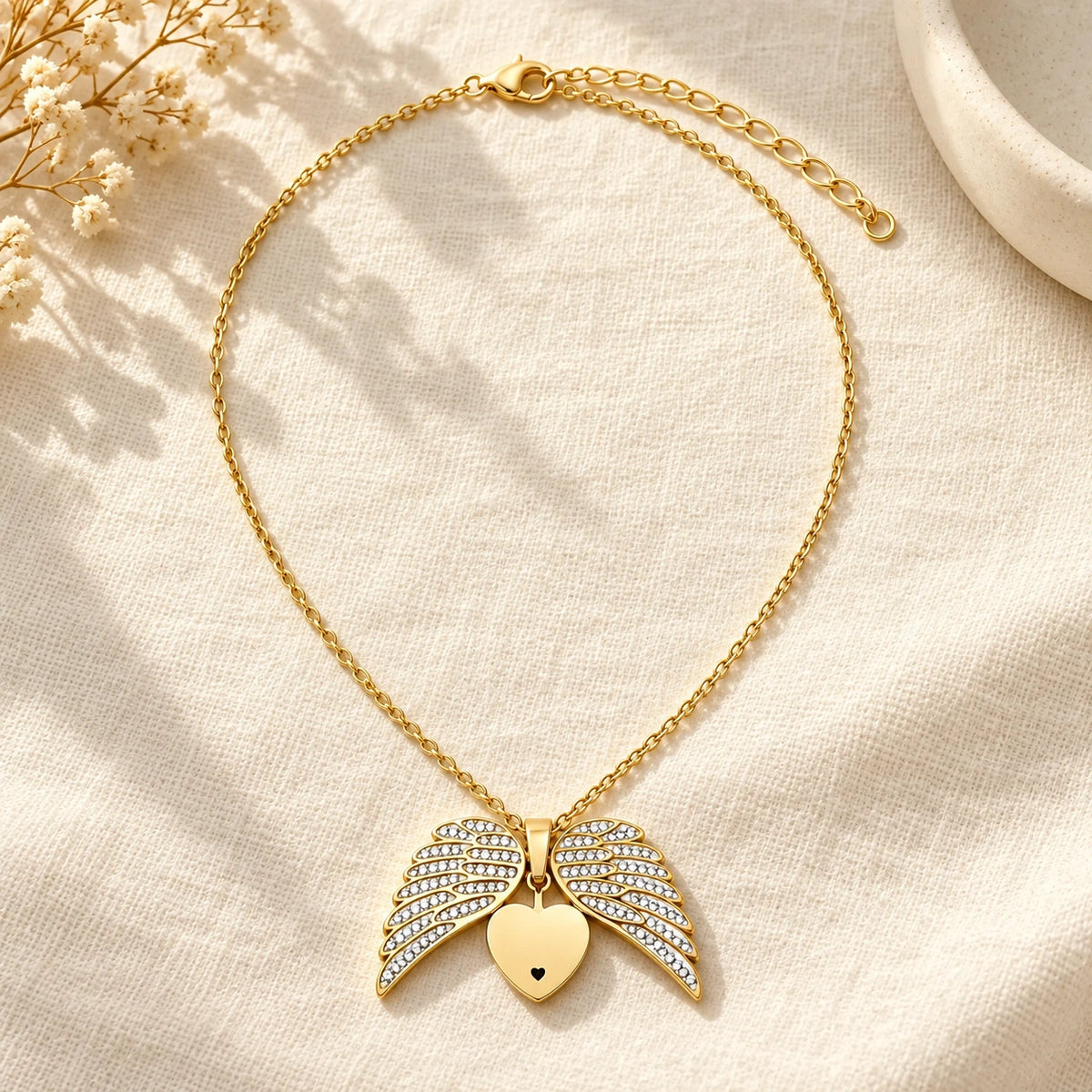 Guardian Angel Necklace laid flat on linen