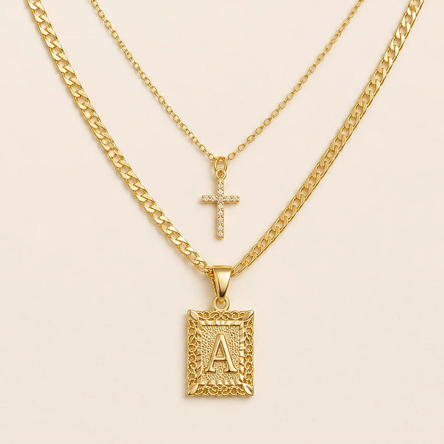 Close detail of Initial & Cross Necklace Set