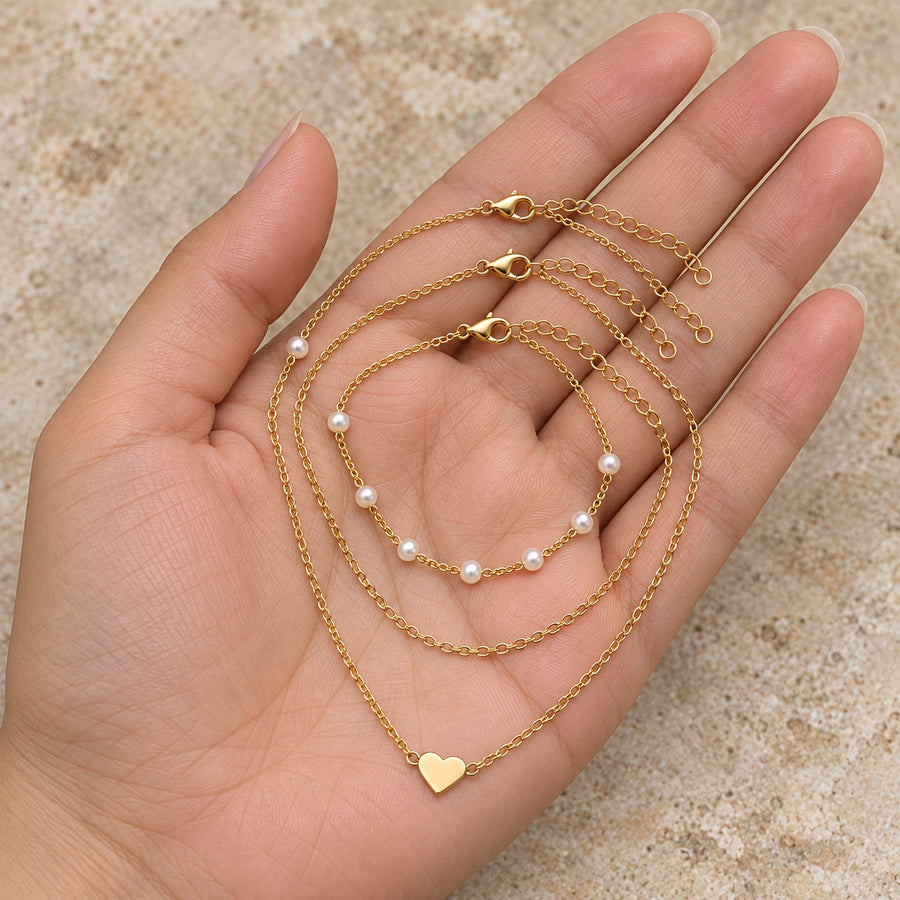 Layered Faux Pearl Necklace Set shown for scale