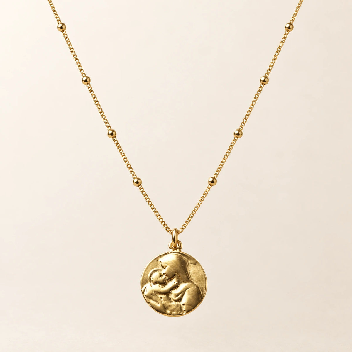 Mother Mary Necklace, gold-plated stainless steel, shown on its own