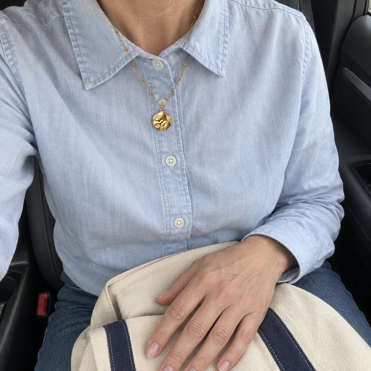 Mother Mary Necklace worn, first-person view