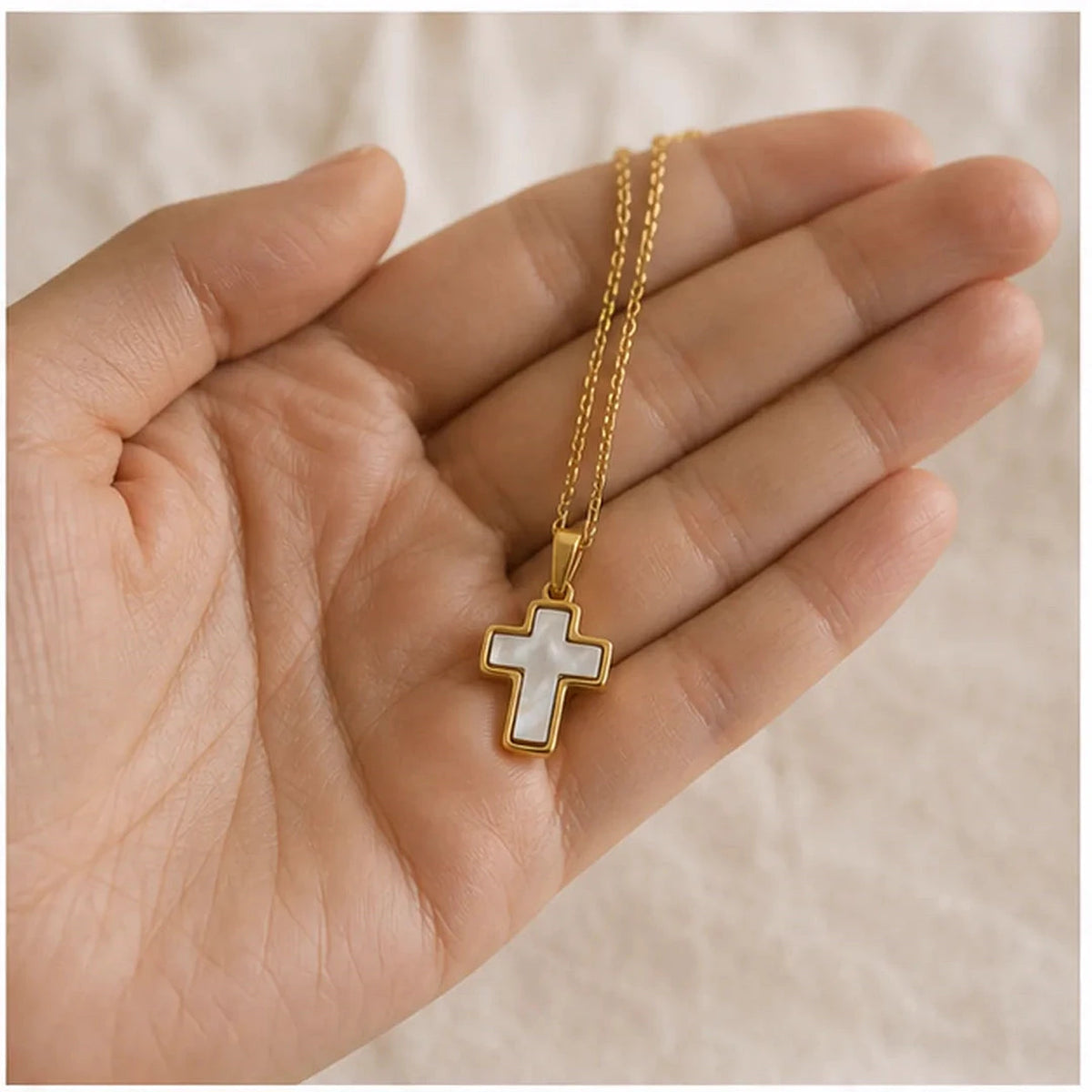Amada | Mother of Pearl Cross Necklace | scale in hand | cycle 3