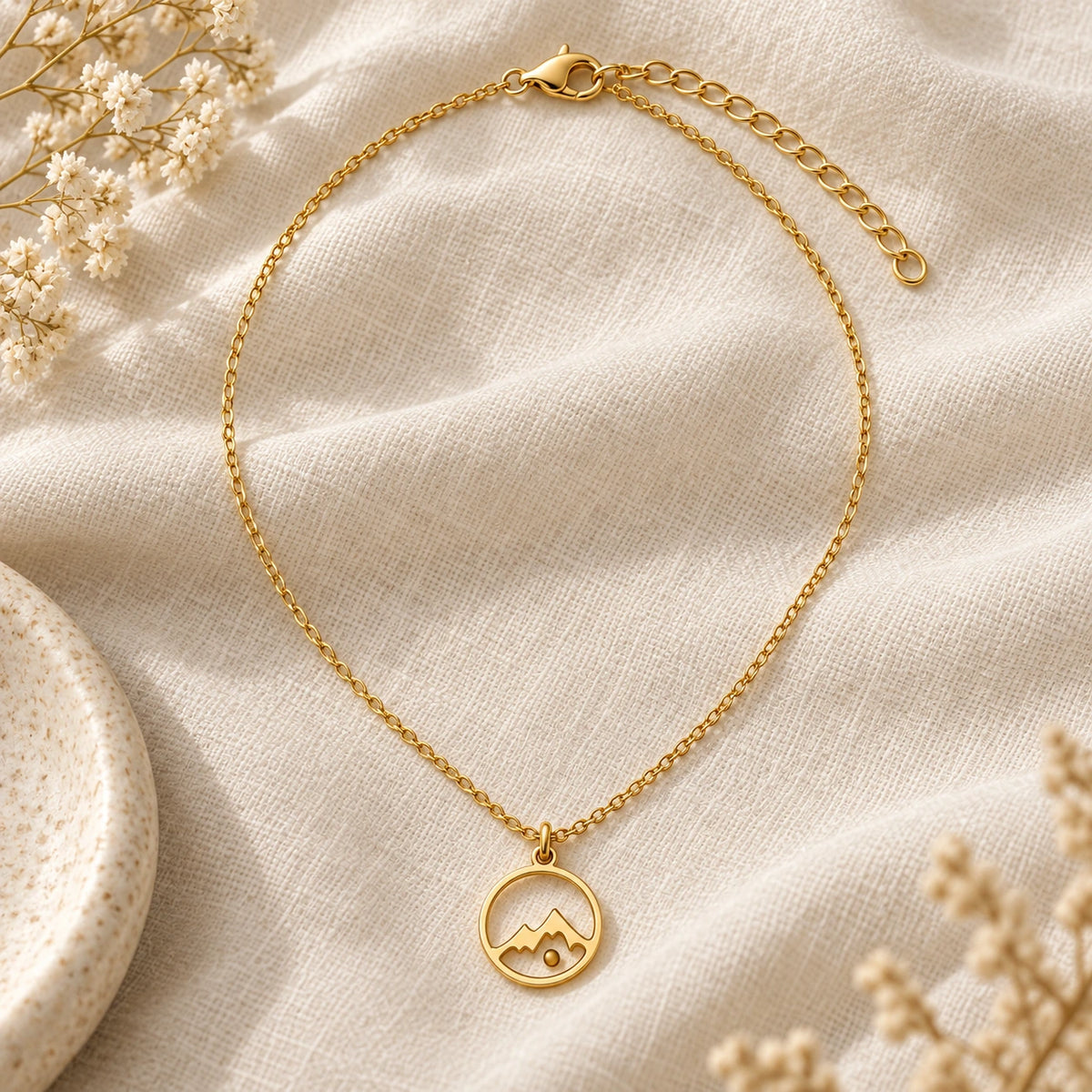 Mustard Seed Necklace laid flat on linen
