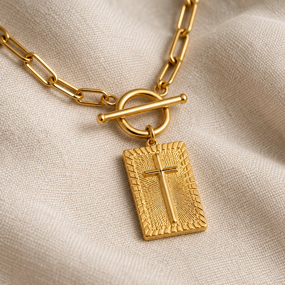 The Nail Cross Necklace, worn and styled