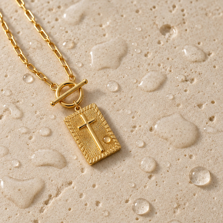Close detail of The Nail Cross Necklace