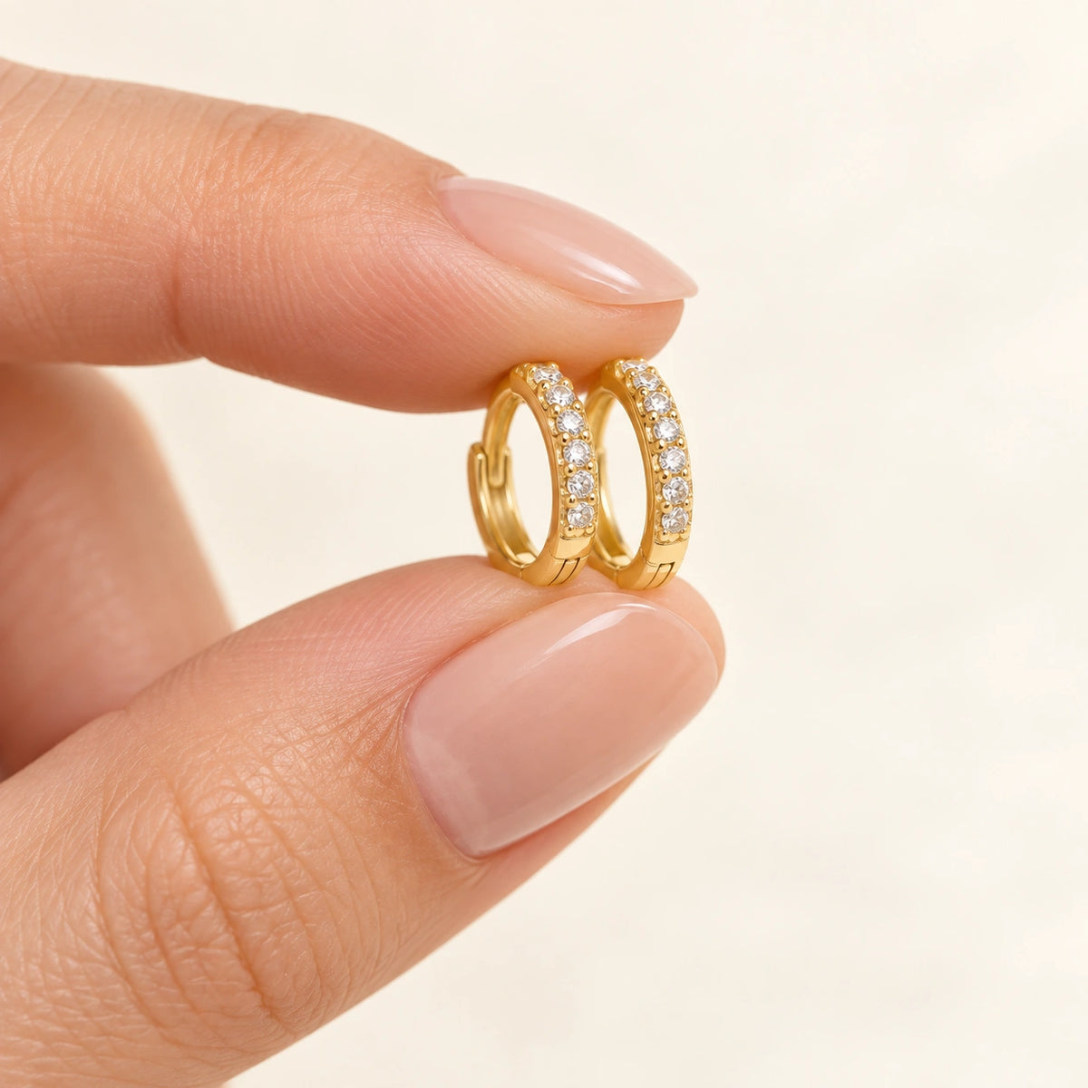 Amada Pave Huggie Earrings shown up close for a sense of its real size.