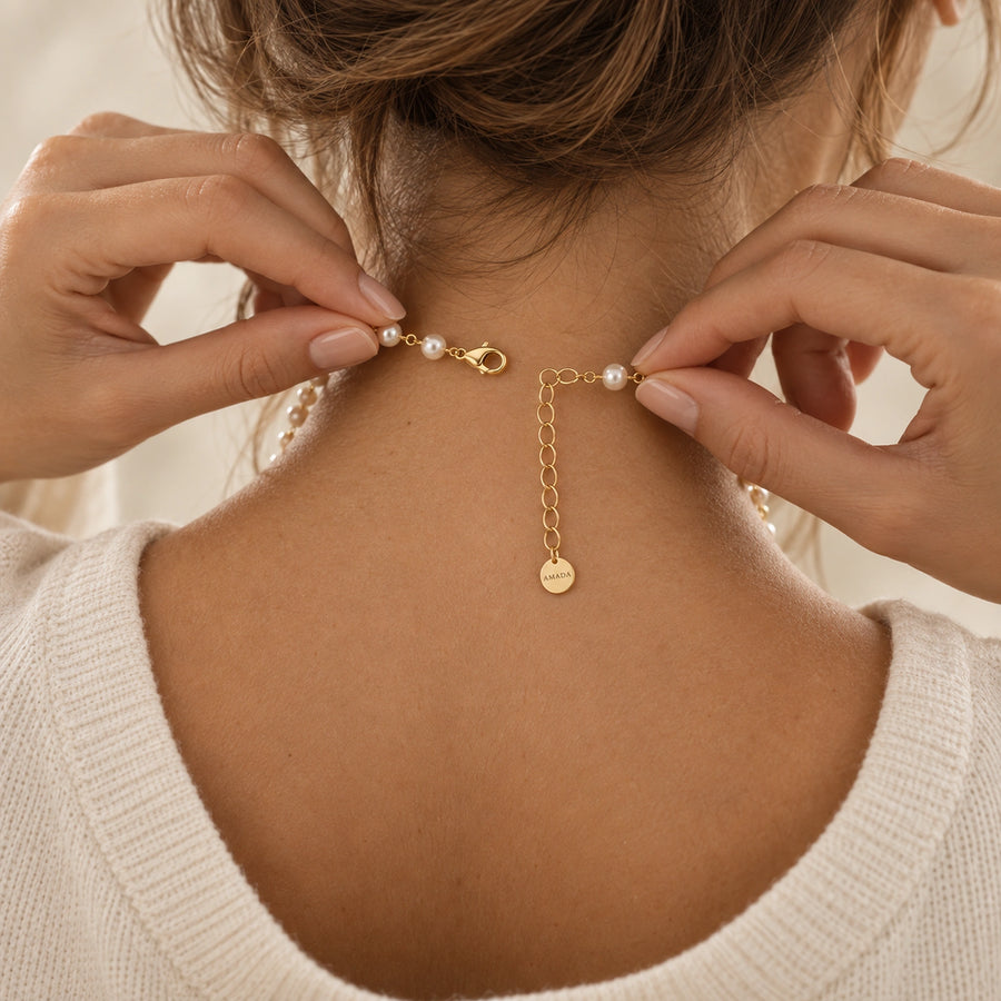Pearl Cross of Grace Necklace styled with other pieces