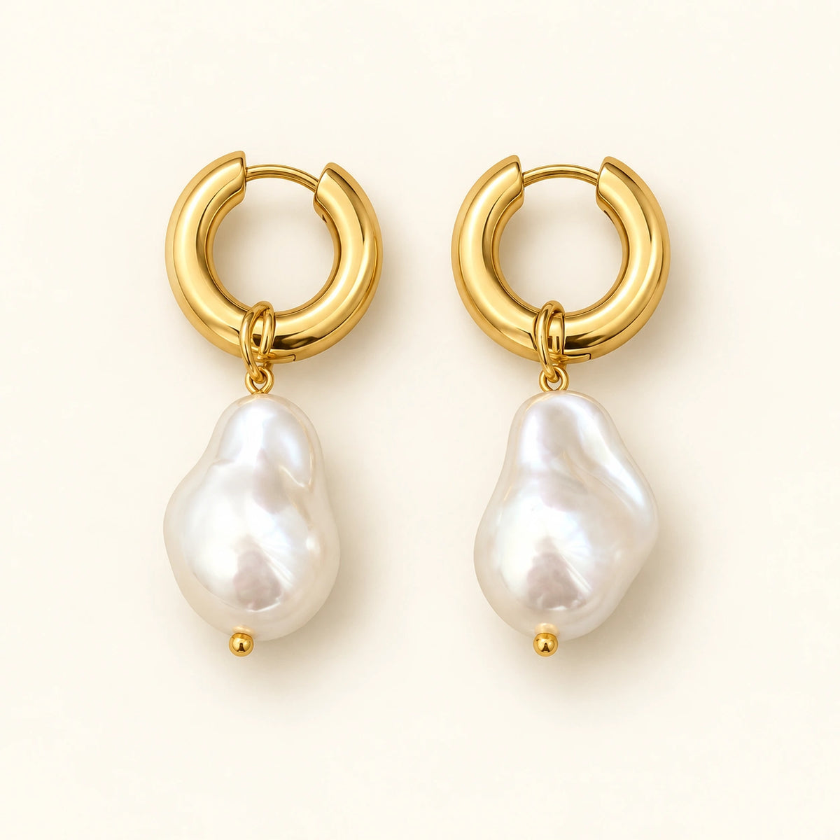Amada Faux Pearl Drop Earrings on a plain light background.