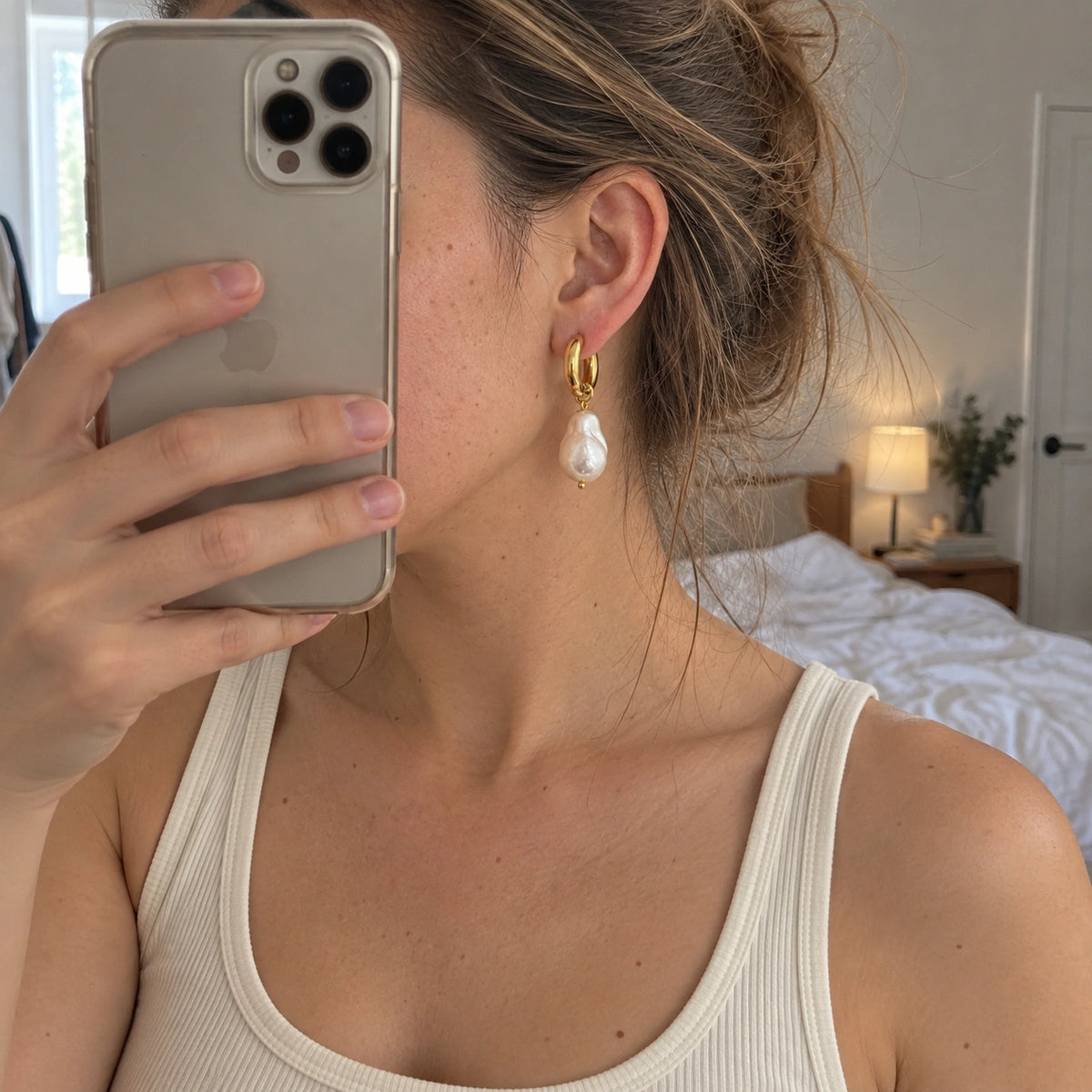 Amada Faux Pearl Drop Earrings worn in an everyday setting.