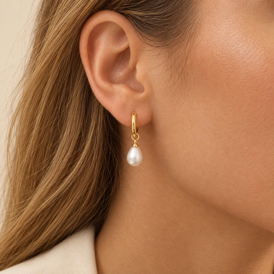 Close detail of Petite Faux Pearl Huggie Earrings