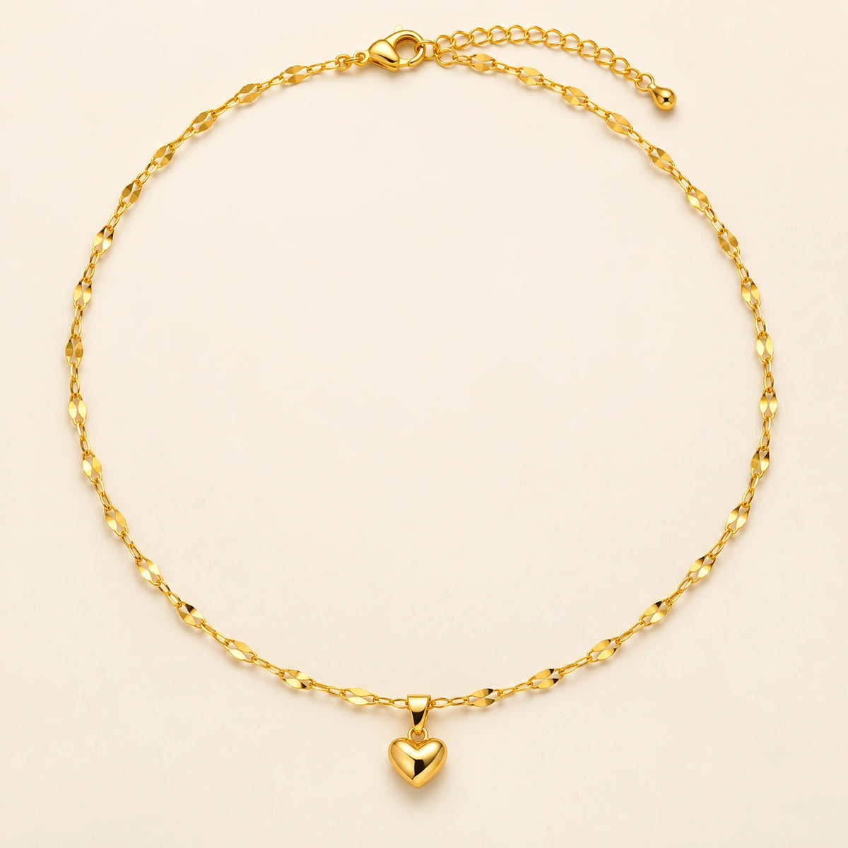 Amada Puffy Heart Necklace on a plain light background.