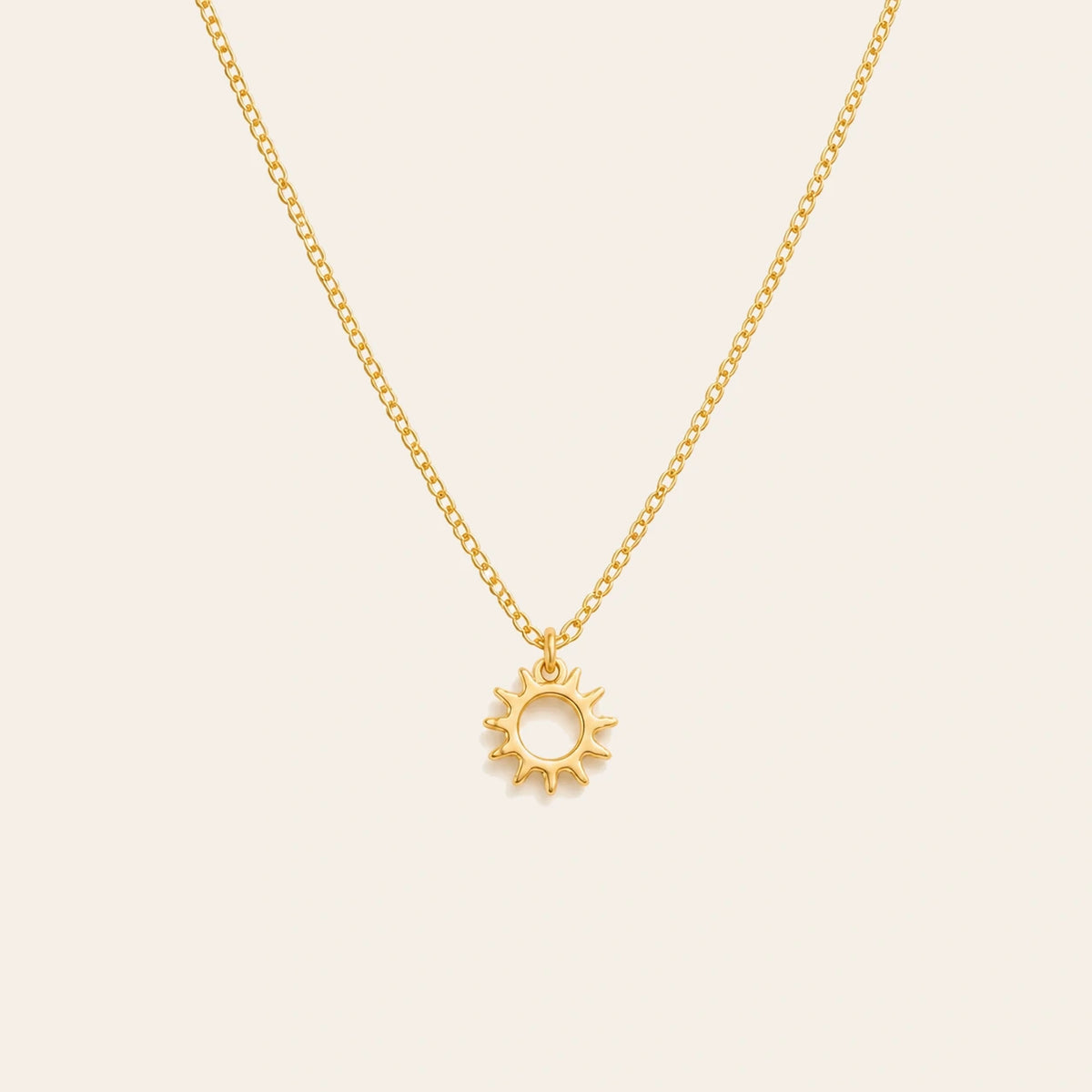 Amada Radiant Sun Pendant on ivory background