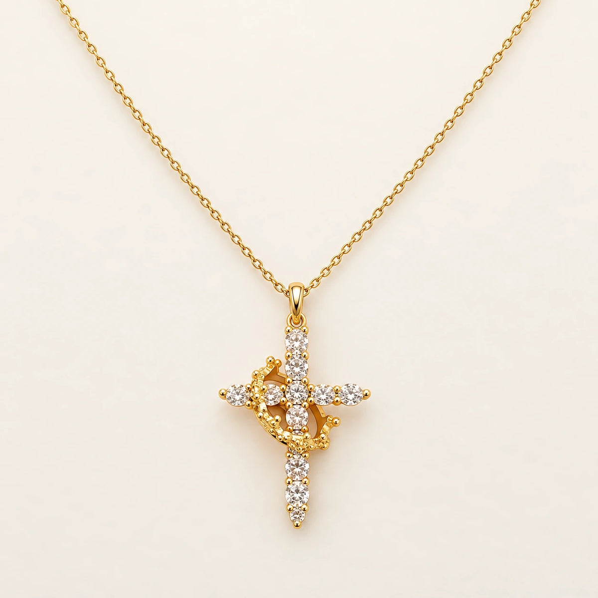 Rotating Crown Cross Necklace, shown on its own