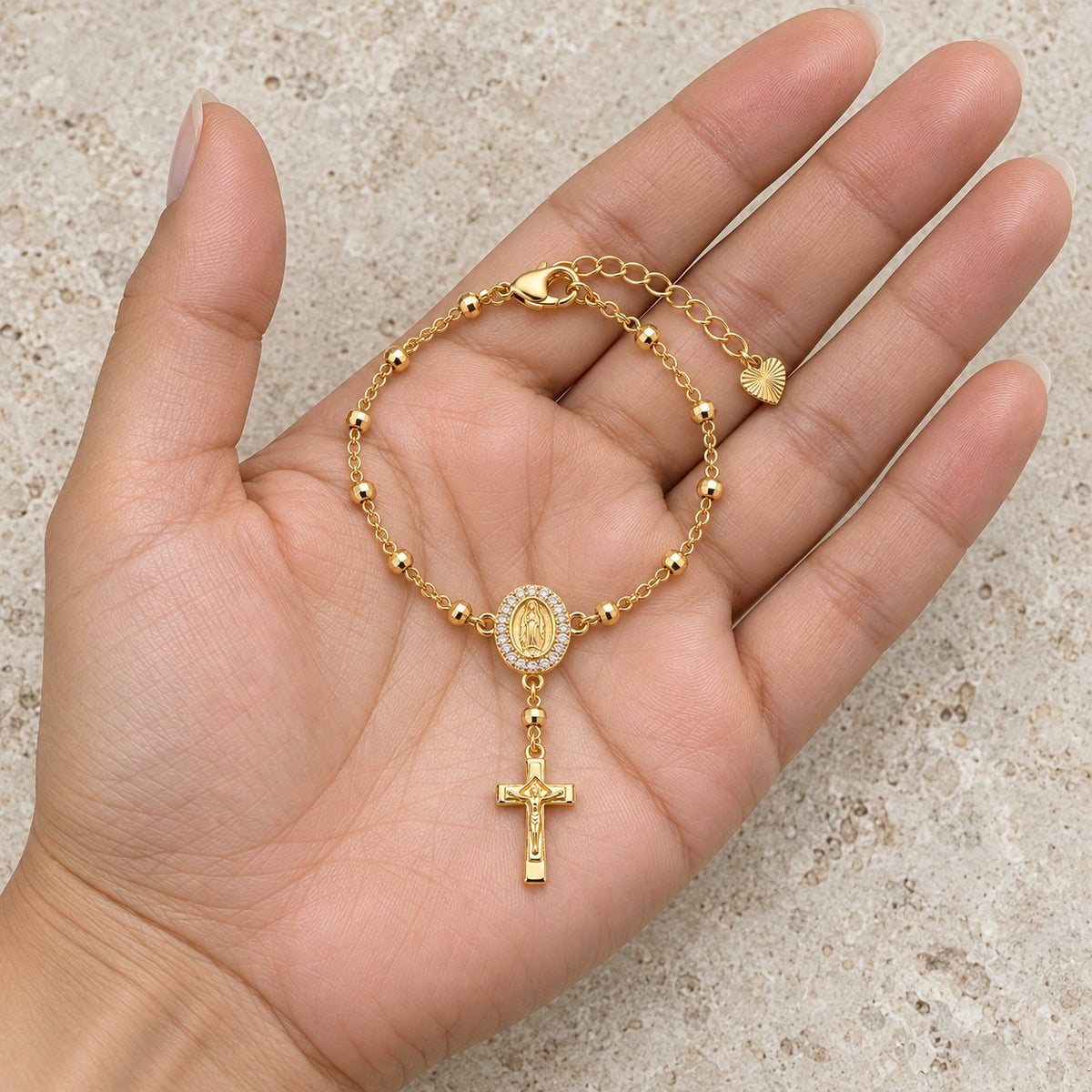 Sacred Rosary Bracelet held in hand, showing its true scale
