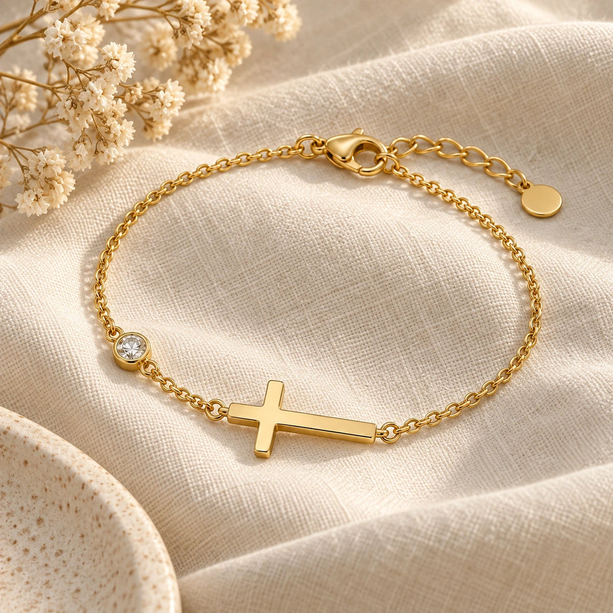Sideways Cross Bracelet laid flat on linen