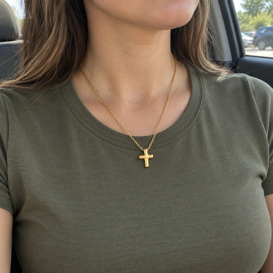 The Bold Cross Necklace styled with other pieces