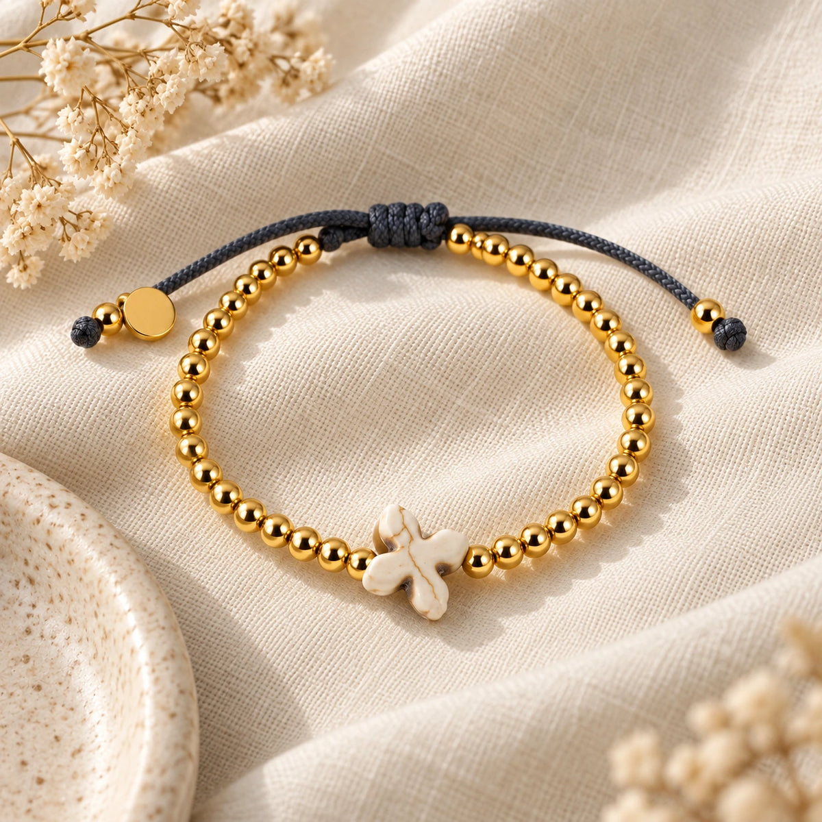 The Prayer Bracelet laid flat on linen