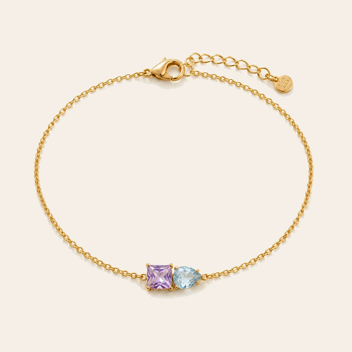 Amada Two Birthstone Bracelet on ivory background