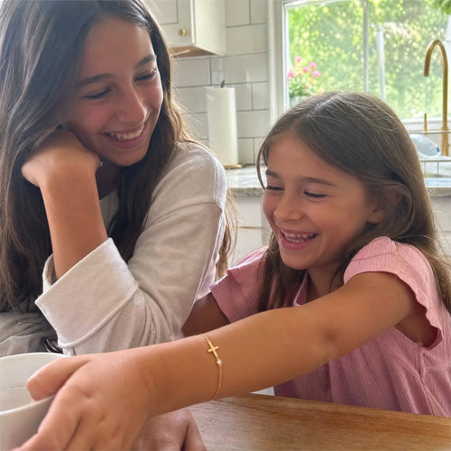 Communion Bracelet being given as a gift, photographed by a customer
