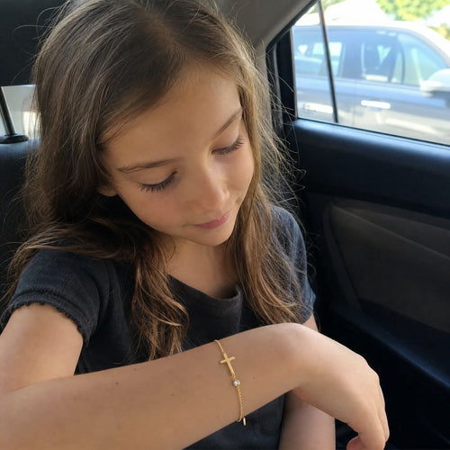 Communion Bracelet being given as a gift, photographed by a customer